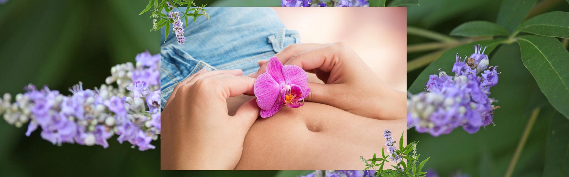 Image of a woman's stomach with hands holding a lily flower over her ovaries